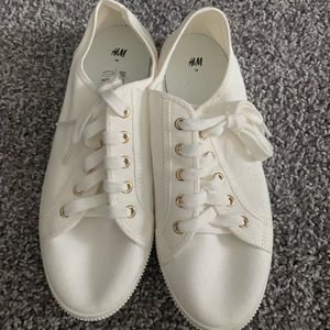 Brand new white H&M shoes.